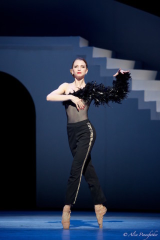 Anna Tikhomirova as the Housekeeper